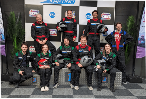 A small group of Sumo Newcastle developers dressed as F1 drivers in a team social