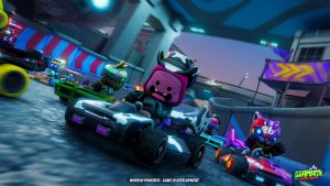 The race is on! Stampede kart racers are speeding through a futuristic looking track, with a jolly looking racer wearing a cowboy hat in a cowprint kart takes the lead.