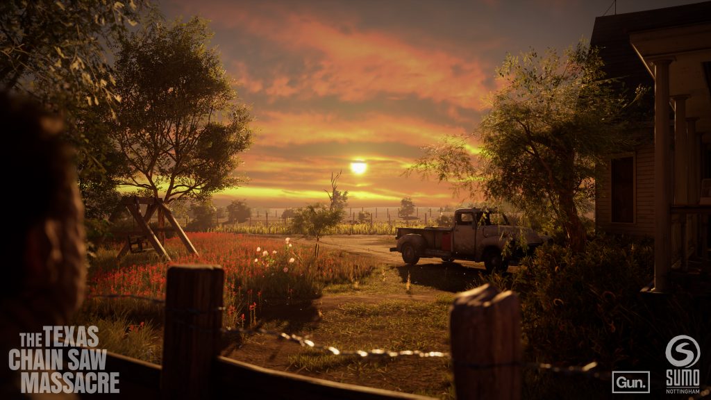 A screenshot from The Texas Chain Saw Massacre. The exterior of the iconic Family House is bathed in sunlight.