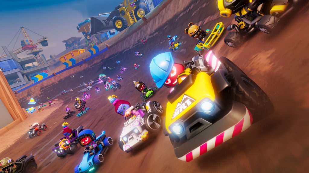 A screenshot from Stampede: Racing Royale. Cartoon kart racers whizz round a construction-themed track. In the lead is a racer wearing a hardhat and driving a kart that looks like heavy machinery.