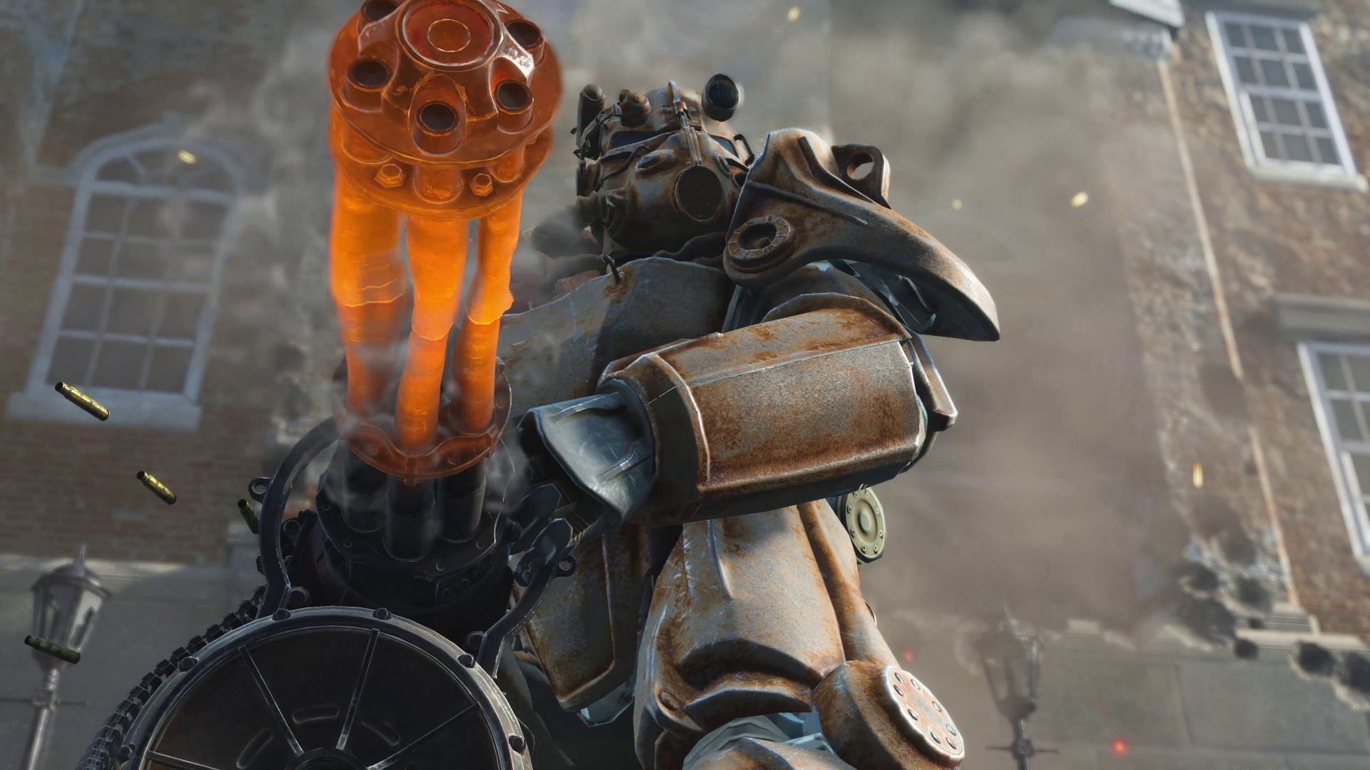 A screenshot from A Storied Life: Tabitha featuring a stylised artstyle that is reminiscent of watercolours. The screenshot shows the item packing screen in-game, featuring a cardboard box on a wooden table. Inside the box is a grid that players must slot in items of varying shapes and sizes, like a puzzle. There is a hand icon hovering over a photograph and next to this is a lined paper pop up with text on it that reads 'Beloved Family Photo. A wallet-sized photograph of a large family. Everyone is smiling.'